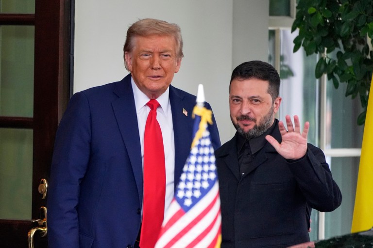 President Donald Trump, left, greets Ukrainian President Volodymyr Zelensky as he arrives at the White House, Monday, Aug. 18, 2025, in Washington.