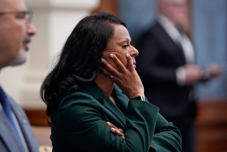 Democratic Texas state Rep. Nicole Collier listens to Texas House Speaker Dustin Burrows announce the need for permission slips for Democratic state representatives to leave the House chamber during the House floor session at the Capitol in Austin, Texas, Monday, Aug. 18, 2025.