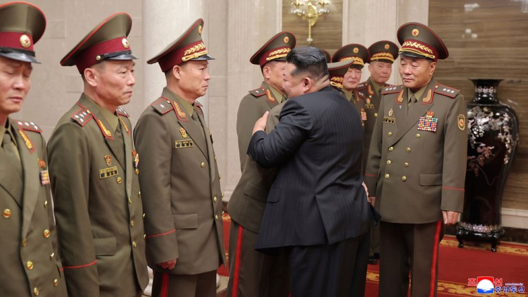 In this photo provided by the North Korean government, North Korean Supreme Leader Kim Jong Un, center right, meets the leading commanding officers deployed to the Kursk region on Wednesday, Aug. 20, 2025, at the headquarters of the Central Committee of the Workers' Party of Korea in Pyongyang, North Korea.