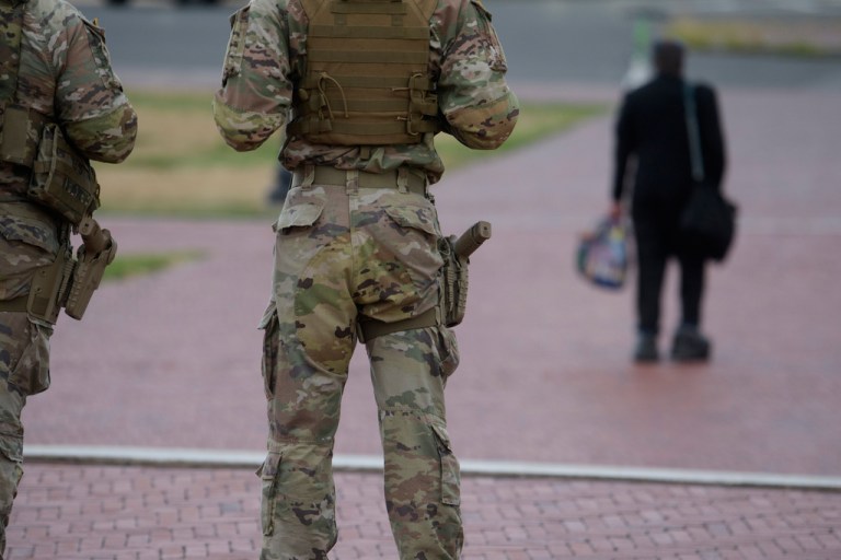 National Guard members begin carrying handguns and rifles during deployment in DC