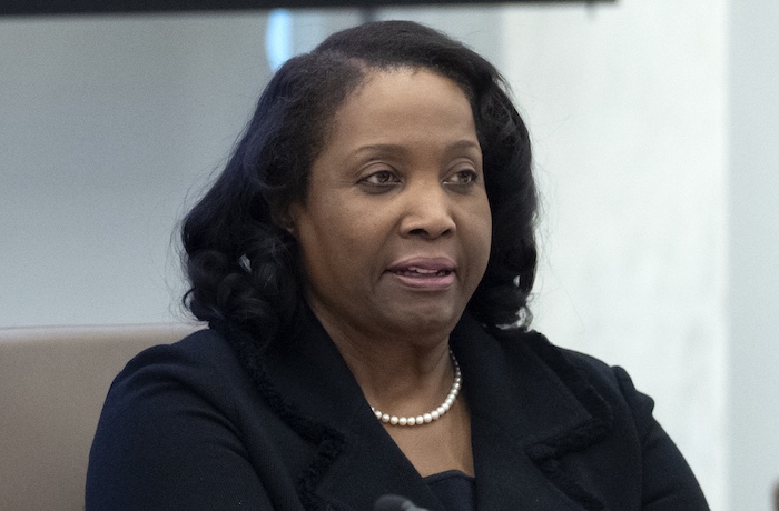 Federal Reserve Board of Governors member Lisa Cook listens during an open meeting of the Board of Governors at the Fed, June 25, 2025, in Washington.