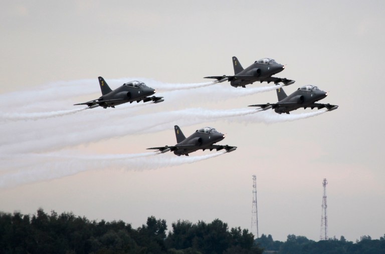 Finnish aerobatics group Midnight Hawks performs during a celebration marking the Russian air force's 100th anniversary in Zhukovsky, outside Moscow, Russia, Saturday, Aug. 11, 2012.
