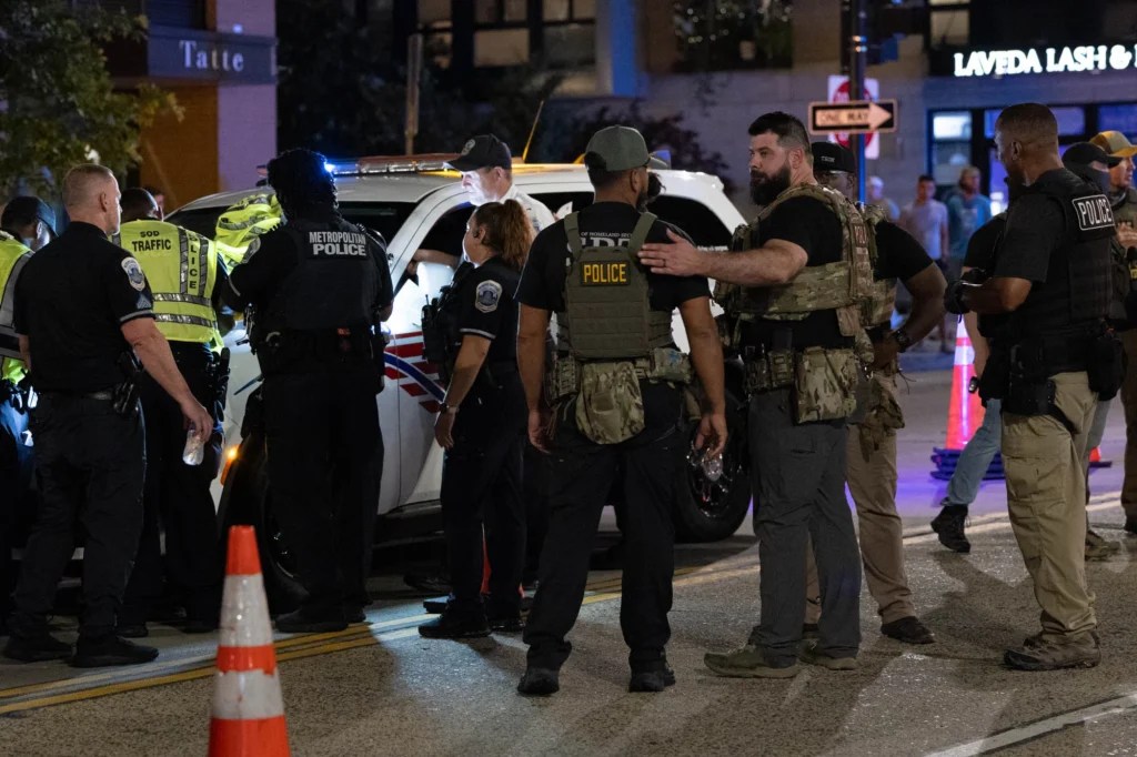 Federal law enforcement officers at a checkpoint on 14th street in Washington D.C., President Donald Trump announced a federal takeover of D.C. Metro police and mobilization of the National Guard and other Federal law enforcement, saying the move is necessary to restoring order in the city. Wednesday, August 13, 2025.