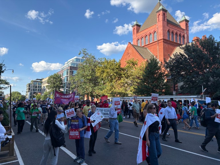 Protesters gathered in front of Le Diplomate in downtown DC