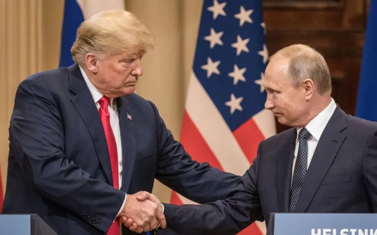 President Donald Trump (L) and Russian President Vladimir Putin shake hands during a joint press conference after their summit on July 16, 2018 in Helsinki, Finland. The two leaders met one-on-one and discussed a range of issues including the 2016 U.S Election collusion. (Photo by Chris McGrath/Getty Images)