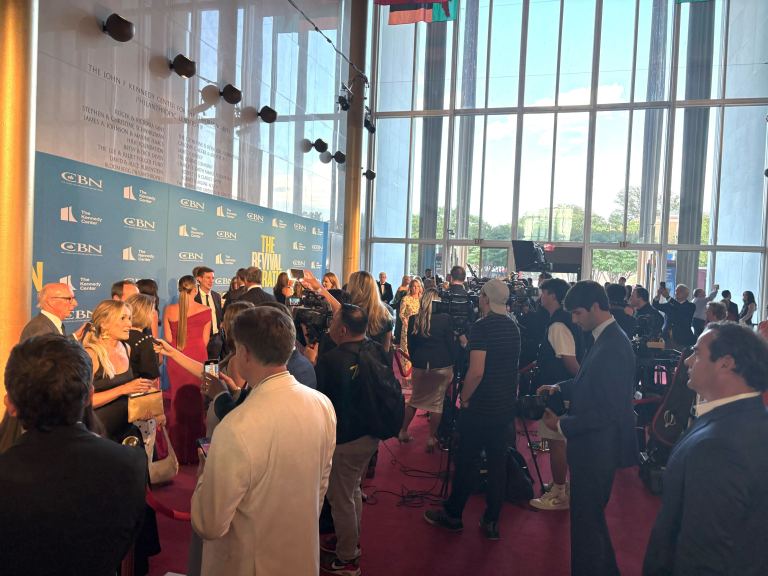 Attendees gather on the red carpet premiere of CBN's 