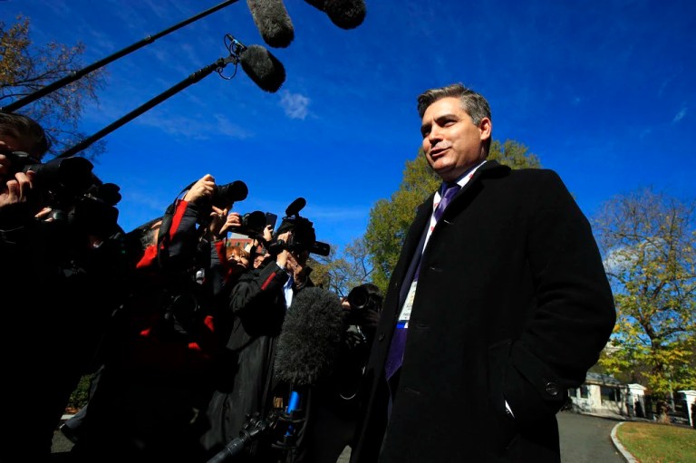 CNN's Jim Acosta speaks to journalists on the North Lawn upon returning back to the White House in Washington, Friday, Nov. 16, 2018. U.S. District Court Judge Timothy Kelly ordered the White House to immediately return Acosta’s credentials. He found that Acosta was “irreparably harmed” and dismissed the government’s argument that CNN could send another reporter in Acosta’s place to cover the White House.