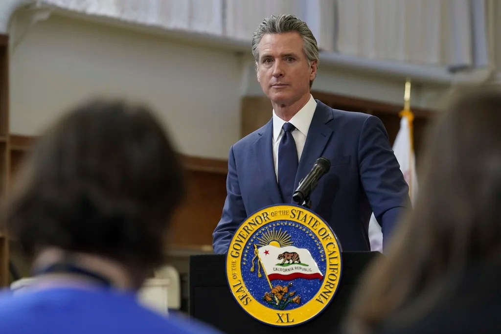 California Gov. Gavin Newsom listens to a reporter's question as he outlines his proposed 2025-2 $322 billion state budget during a news conference at California State University, Stanislaus in Turlock, Calif., Monday, Jan. 6, 2025.