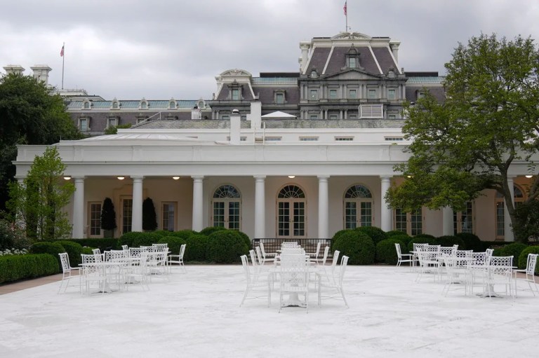 Tables and chairs are placed in the Rose Garden at the White House Friday, Aug. 1, 2025, in Washington.