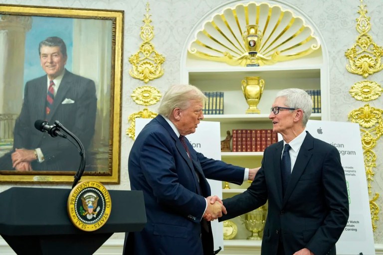 President Donald Trump shakes hands with Apple CEO Tim Cook in the Oval Office, Wednesday, Aug. 6, 2025, in Washington.