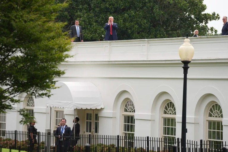President Donald Trump walks on the roof of the White House briefing room, Monday, August 5, 2025, in Washington.