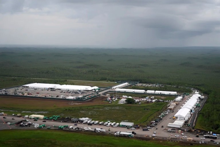 Work progresses on a new migrant detention facility dubbed 