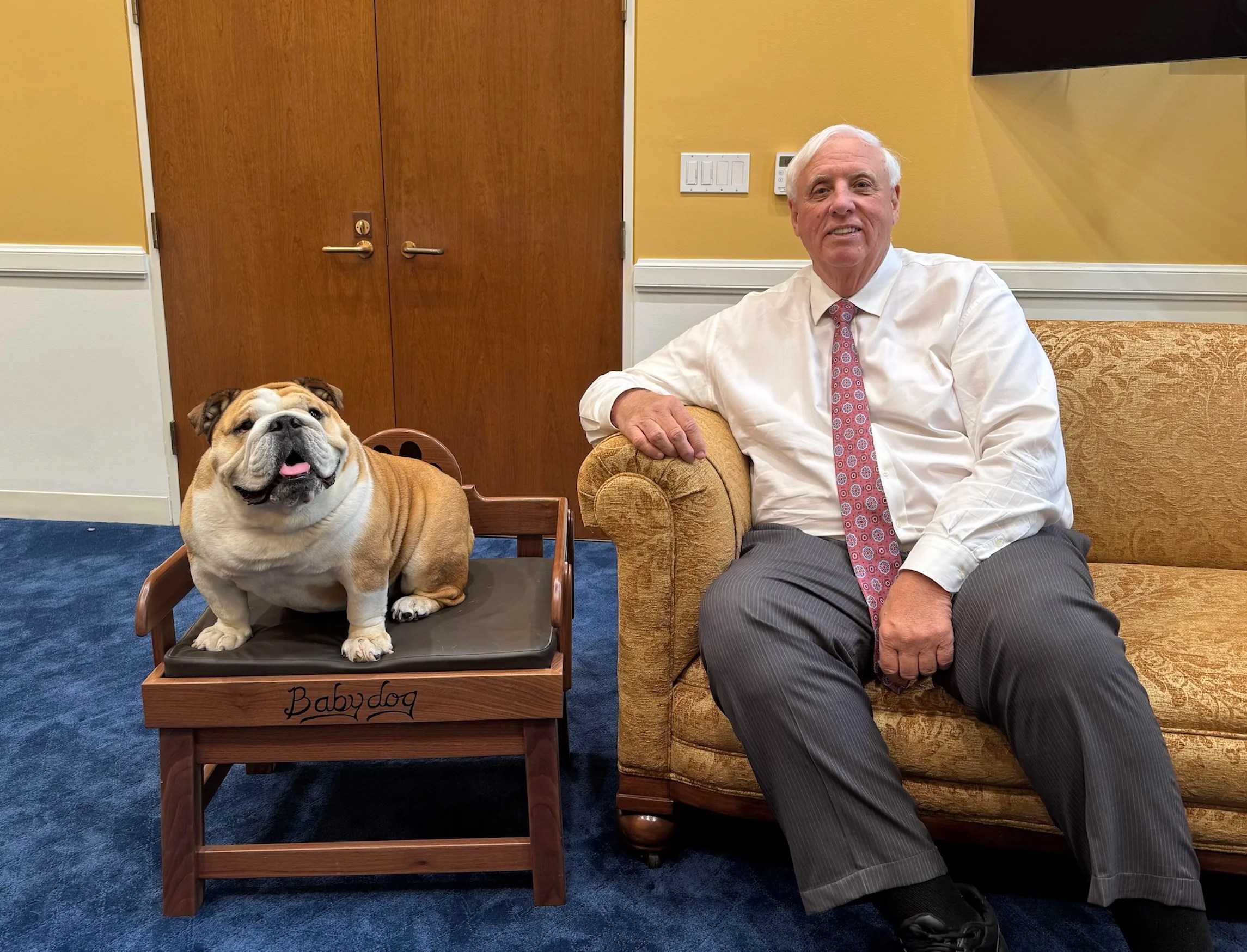 Sen. Jim Justice (R-WV) poses with Babydog, his English bulldog, on July 24, 2025.