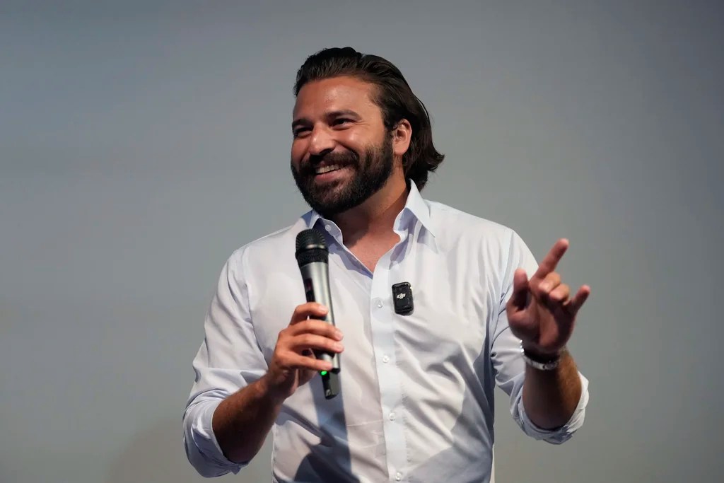 Brandon Herrera, a gun-rights YouTube creator who calls himself "The AK Guy", speaks during a campaign stop, Thursday, May 23, 2024, in San Antonio. Herrera is facing prominent Republican incumbent U.S. Rep. Tony Gonzales in a runoff election. 