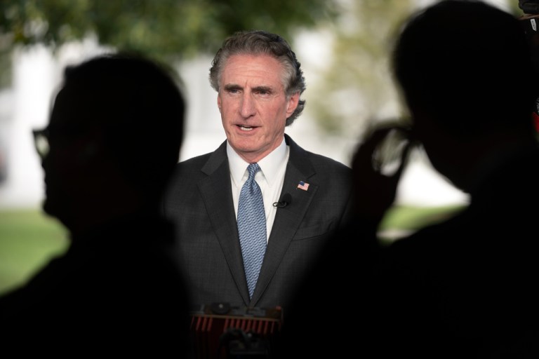 Interior Secretary Doug Burgum speaks during a television interview outside the White House, Tuesday, Aug. 12, 2025, in Washington.
