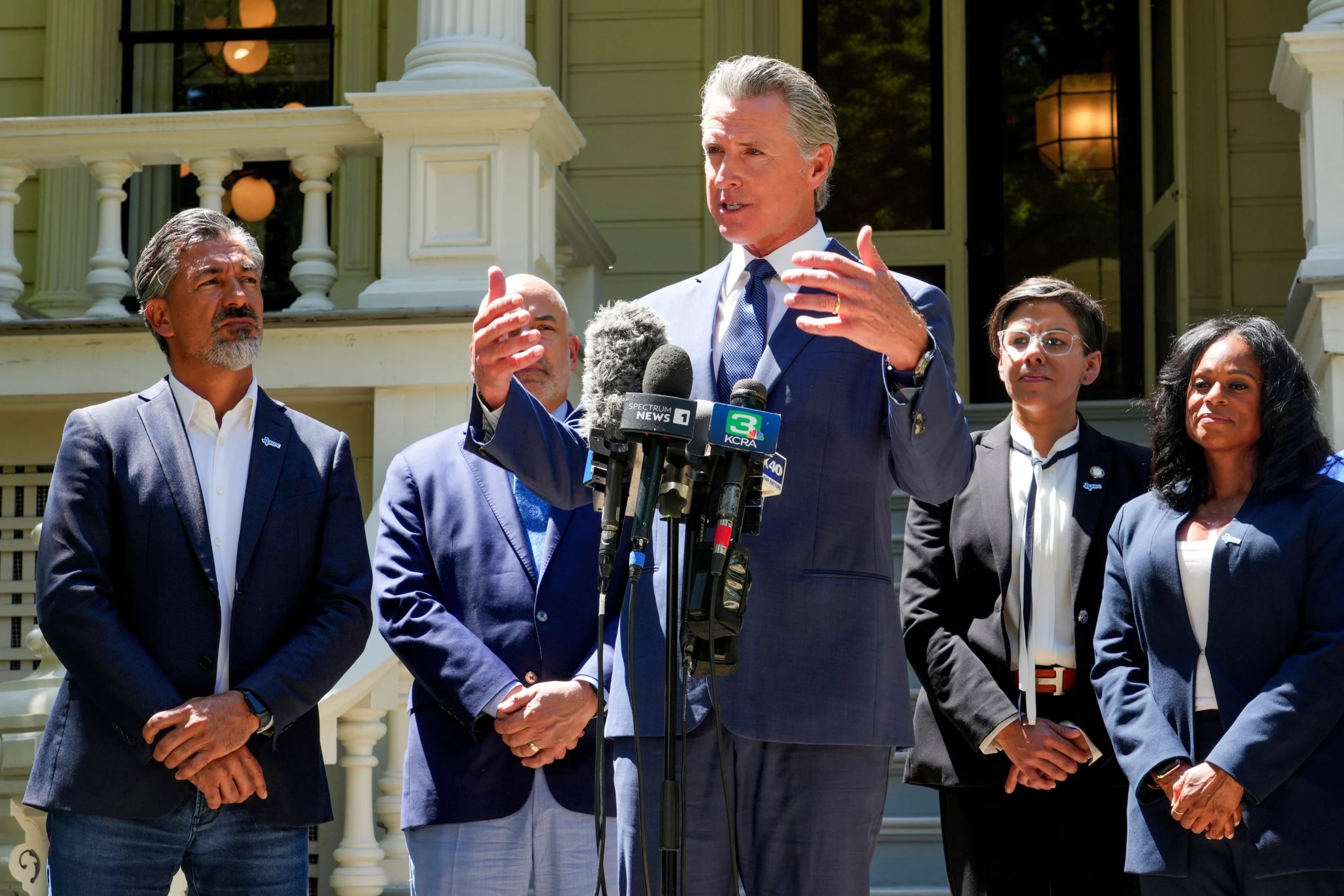 California Gov. Gavin Newsom, accompanied by several members of the Texas state Legislature, calls for a new way for California to redraw its voting districts during a news conference In Sacramento, Calif., Friday July 25, 2025.