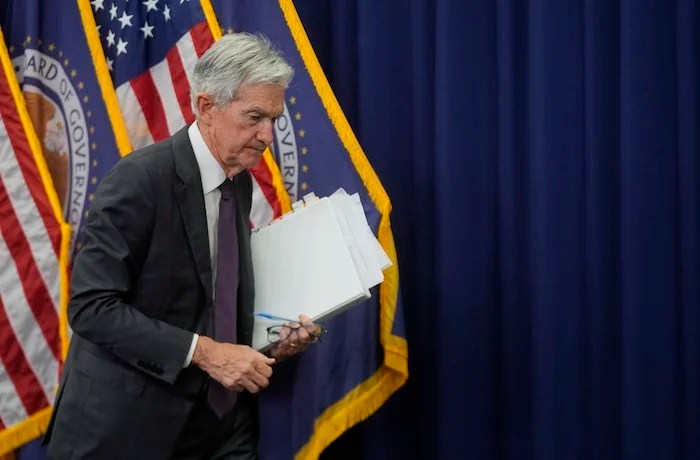 Federal Reserve Chairman Jerome Powell walks off after speaking during a news conference following the Federal Open Market Committee meeting