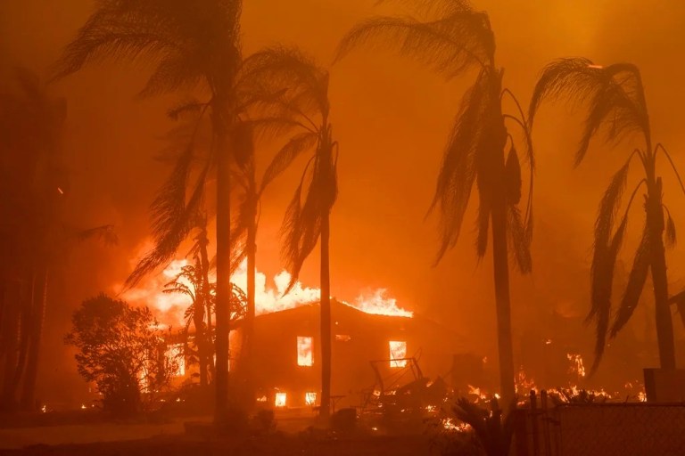 A home burns in the Eaton Fire in Altadena, California, Jan. 8, 2025.