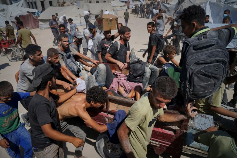 Israeli forces kill at least 33 Palestinians seeking food after opening fire on crowds