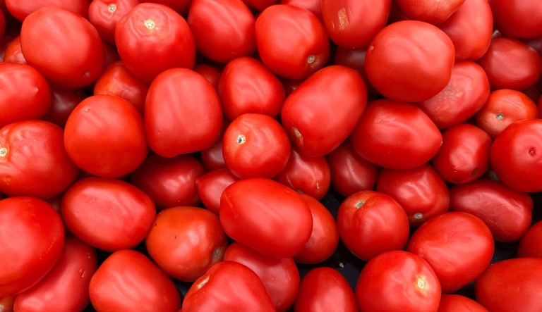 Tomatoes are displayed at a grocery in Mount Prospect, Ill., Thursday, July 17, 2025. (AP Photo/Nam Y. Huh)