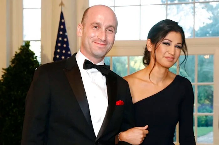President Donald Trump's White House Senior Adviser Stephen Miller, left, and Katie Waldman arrive for a State Dinner with Australian Prime Minister Scott Morrison and President Donald Trump at the White House, Friday, Sept. 20, 2019, in Washington. (AP Photo/Patrick Semansky)
