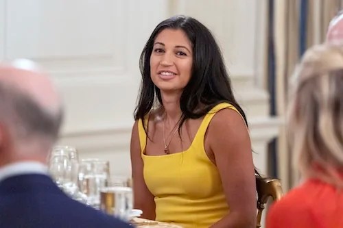 Katie Miller sits during a dinner for Republican senators in the State Dining Room of the White House, Friday, July 18, 2025, in Washington. (AP Photo/Alex Brandon)