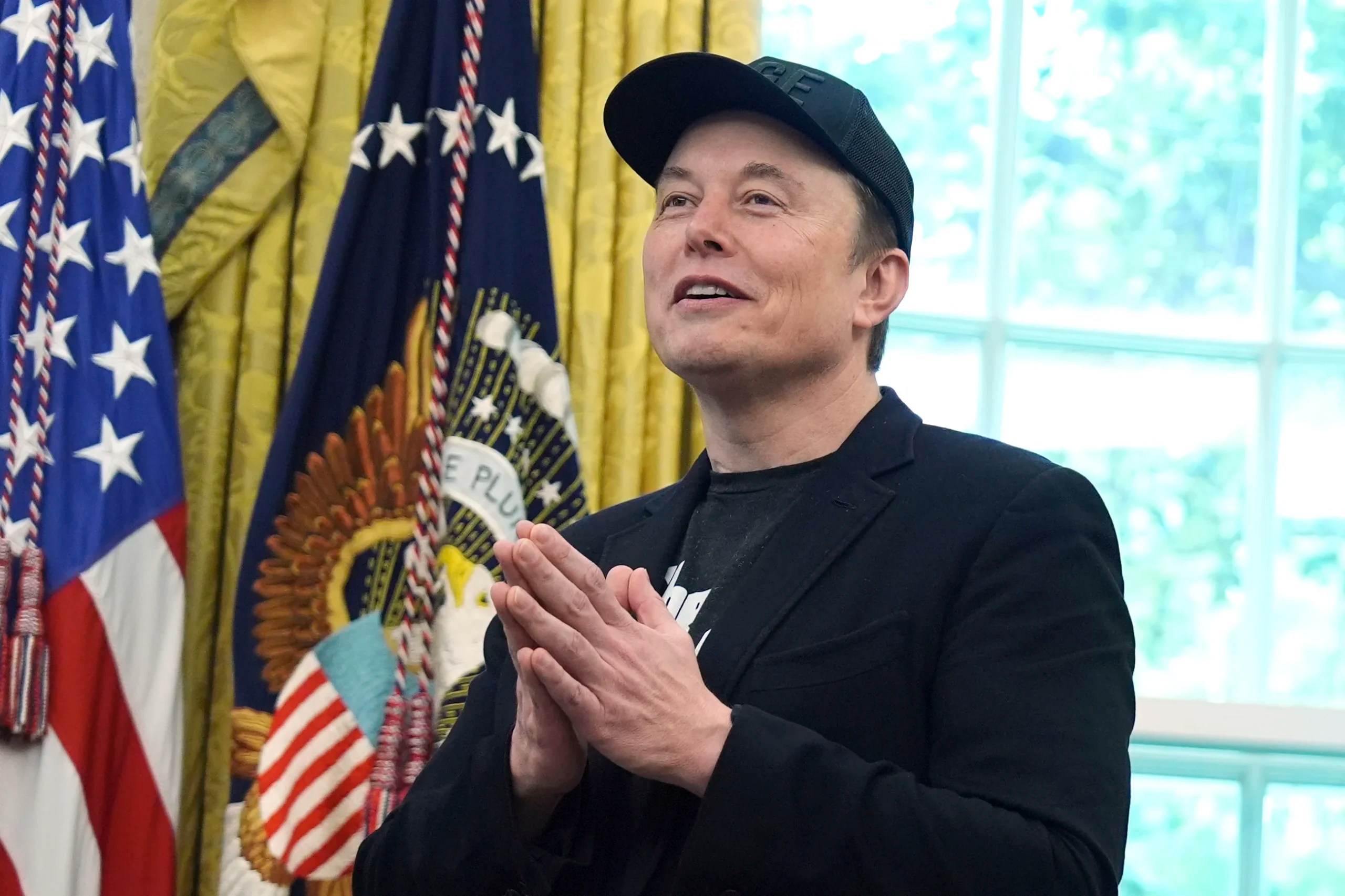 Tesla gives Musk $30 billion more in stock after he threatened to leave