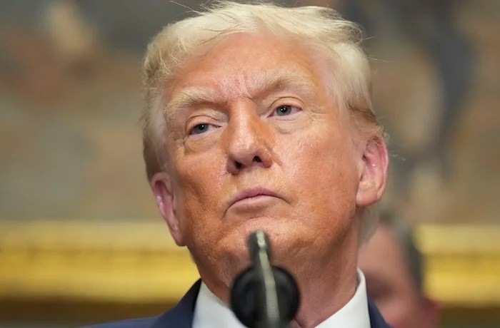 BLS - President Donald Trump listens during an event to sign an executive order restarting the Presidential Fitness Test in public schools, Thursday, July 31, 2025