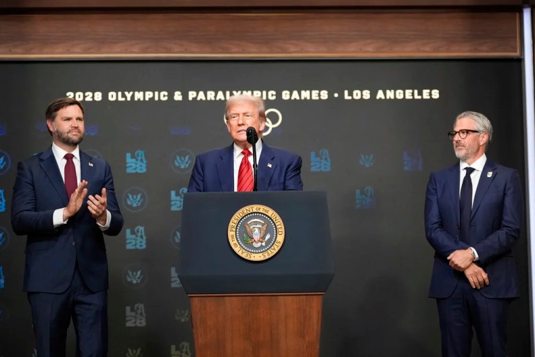 President Donald Trump speaks before signing an executive order about the 2028 Los Angeles Olympic Games, in the South Court Auditorium of the Eisenhower Executive Office Building on the White House campus, Tuesday, Aug. 5, 2025, in Washington, as Vice President JD Vance and Casey Wasserman, chairman of LA28.