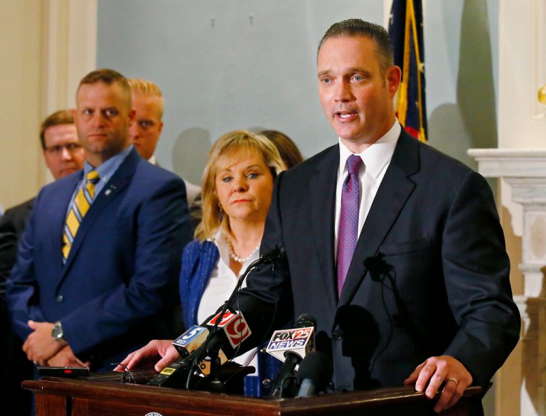 Speaker of the Oklahoma House Charles McCall, R-Atoka, speaks at a news conference to announce a deal to shore up the state budget and raise pay for teachers and some state workers with a series of tax increases during a news conference in Oklahoma City, Monday, Oct. 23, 2017, but it's unclear if there is enough support to pass the plan. Gov. Mary Fallin and members of the legislature are at left. (AP Photo/Sue Ogrocki)