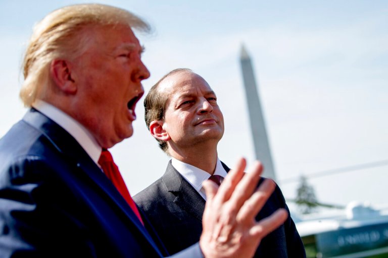 President Donald Trump, accompanied by Labor Secretary Alex Acosta, speaks to members of the media.