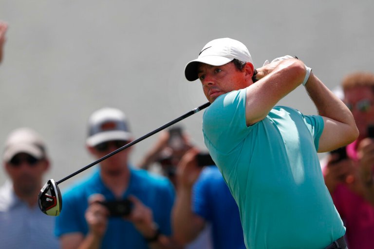 Rory McIlroy hits fro the tee on the sixth hole during second round play in the Tour Championship golf tournament Friday, Aug. 23, 2019, at Eastlake Golf Club in Atlanta. (AP Photo/John Bazemore)