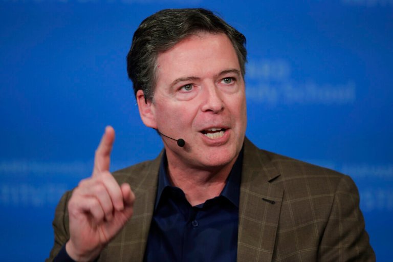 James Comey speaks at an event.