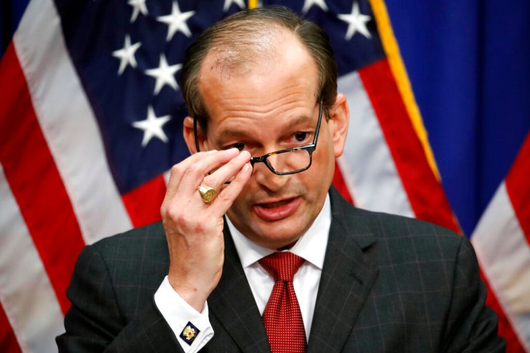 Labor Secretary Alex Acosta speaks during a news conference.