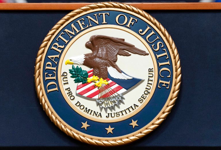 The Department of Justice seal.