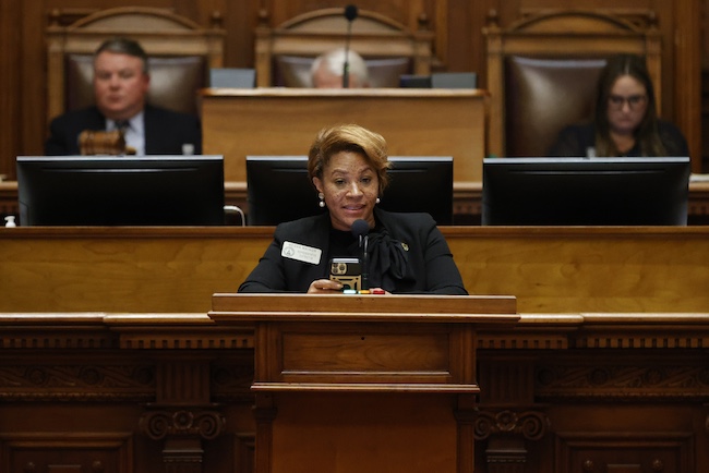 Georgia state Rep. Mesha Mainor, center, speaks on March 6, 2023, in the House Chamber at the Georgia Capitol in Atlanta.