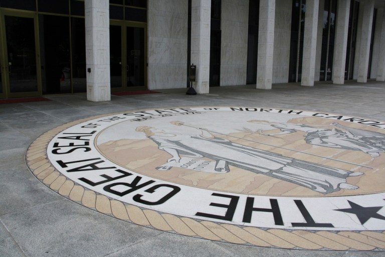 North Carolina's state seal is seen in front of the Legislative Building in Raleigh, N.C., Wednesday, June 5, 2024. The state's General Assembly is made up of the North Carolina House of Representatives and the North Carolina Senate. (AP Photo/Makiya Seminera)