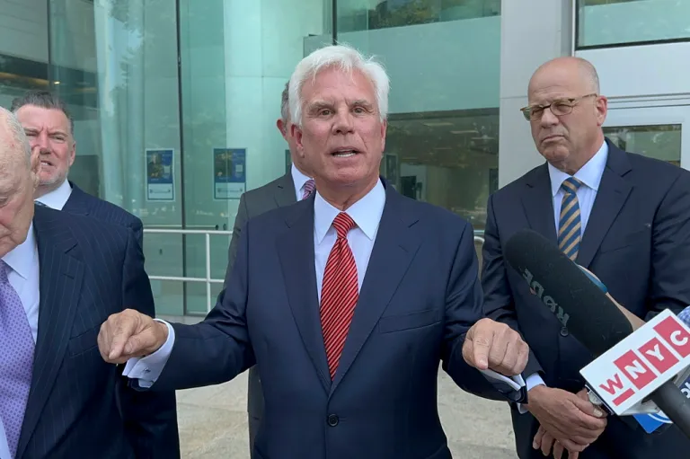Influential Democratic power broker George Norcross speaks outside the justice complex in Trenton, New Jersey.