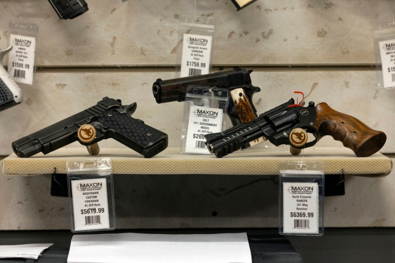 Guns for sale are displayed at Maxon Shooter's Supplies in Des Plaines, Illinois.