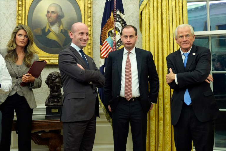From left, Lindsey Halligan, White House deputy chief of staff Stephen Miller, White House staff secretary Will Scharf and Peter Navarro listen President Donald Trump speaks with reporters as he signs executive orders in the Oval Office at the White House, Monday, Feb. 10, 2025, in Washington. (Photo/Alex Brandon)