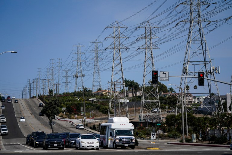 Power transmission towers line a street in Redondo Beach, California.