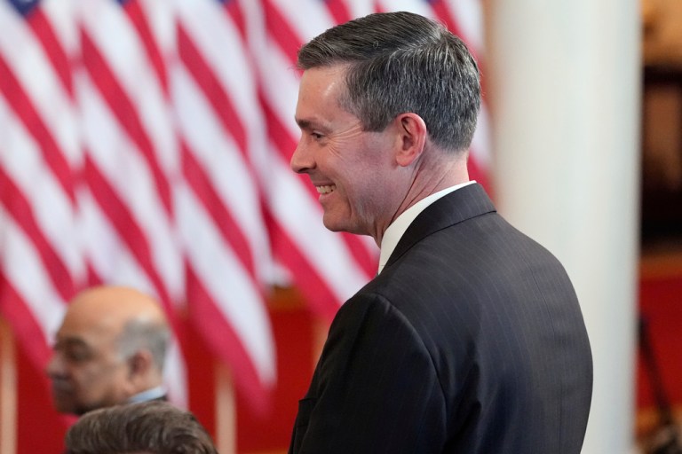 Eli Lilly and Company CEO David Ricks stands as President Donald Trump speaks about investing in America in the Cross Hall of the White House, Wednesday, April 30, 2025, in Washington.