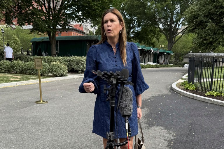 Gov. Sarah Huckabee Sanders (R-AK) talks to the press as she visits the White House.
