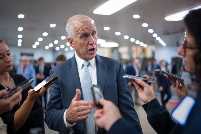 Sen. Thom Tillis, R-N.C., speaks with reporters at the Capitol in Washington, Sept. 25, 2024