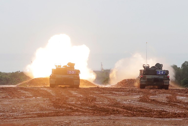 M1A2T Abrams Main Battle Tanks fire during a military live-fire shooting