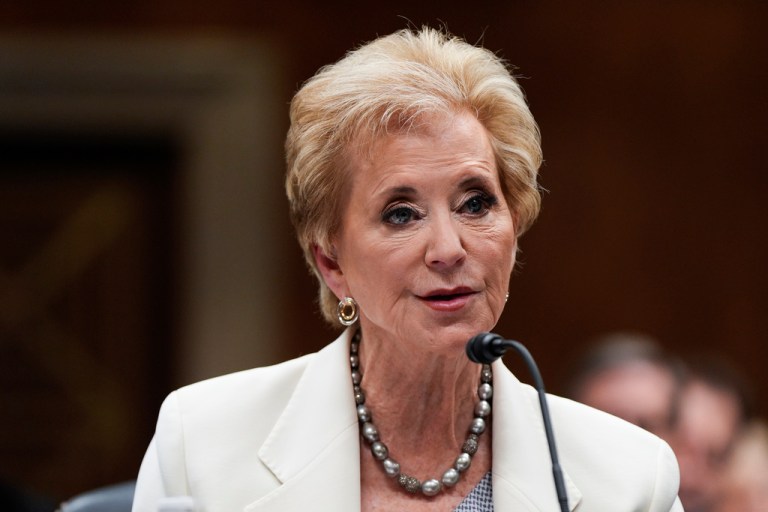 Education Secretary Linda McMahon speaks into a microphone.