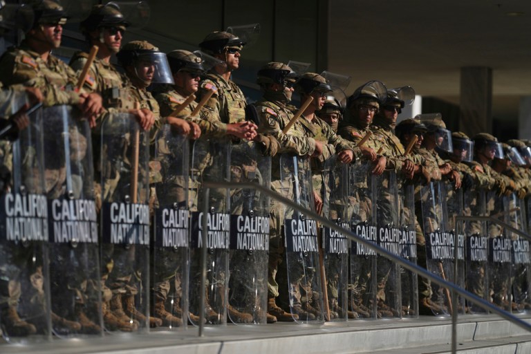California National Guard are positioned at the Federal Building, June 10, 2025, in downtown Los Angeles.