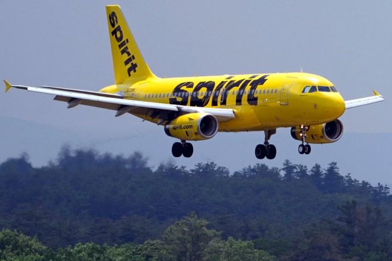 A Spirit Airlines 319 Airbus approaches Manchester Boston Regional Airport for a landing, Friday, June 2, 2023, in Manchester, N.H. (AP Photo/Charles Krupa, File)