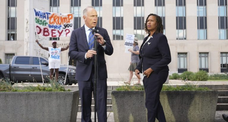 District of Columbia Attorney General Brian Schwalb, left, and District of Columbia Mayor Muriel Bowse, right, speaking to members of the media after a hearing at Federal Court in Washington, Friday, Aug. 15, 2026.