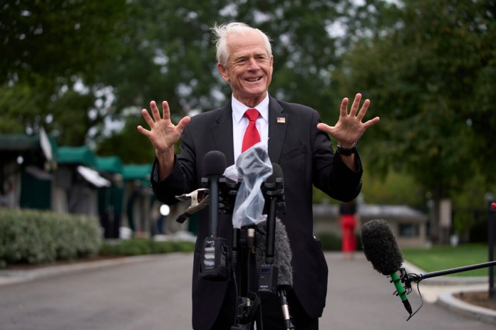 White House trade counselor Peter Navarro speaks with reporters at the White House, Thursday, Aug. 21, 2025, in Washington.